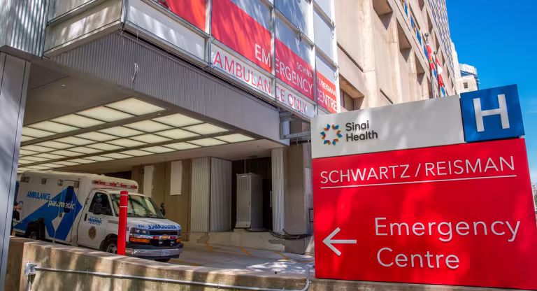 Ambulance parked outside the Emergency Department entrance at Mount Sinai Hospital in Toronto.
