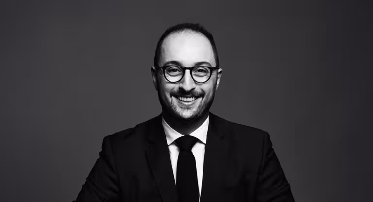 Black and white portrait of Zach Rosen