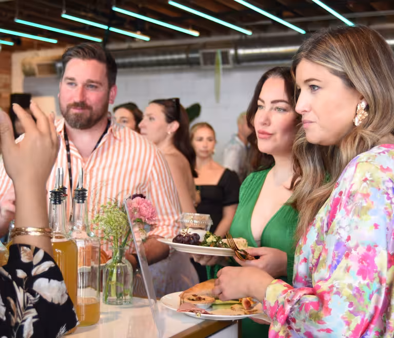 Group of people talking at a social event