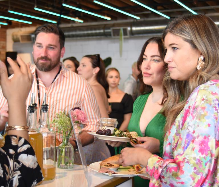 Group of people talking at a social event