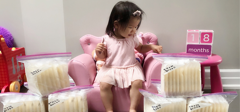 Alexie poses with bags of breast milk for donation