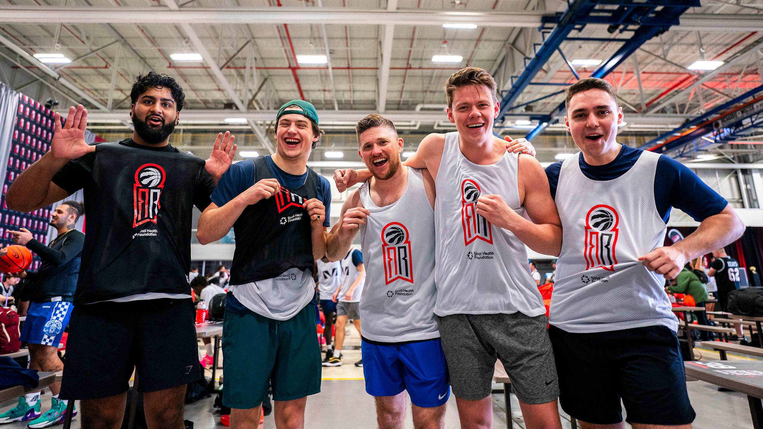 Group of basketball players at Raptors for Research event